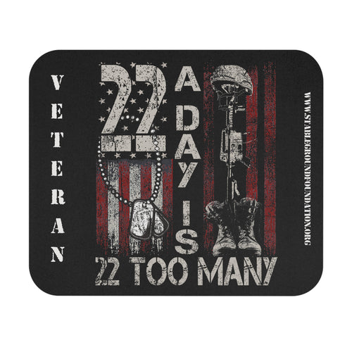 Mouse pad design featuring text 22 A Day Is 22 Too Many with military helmet, boots, and dog tags against a distressed American flag background.