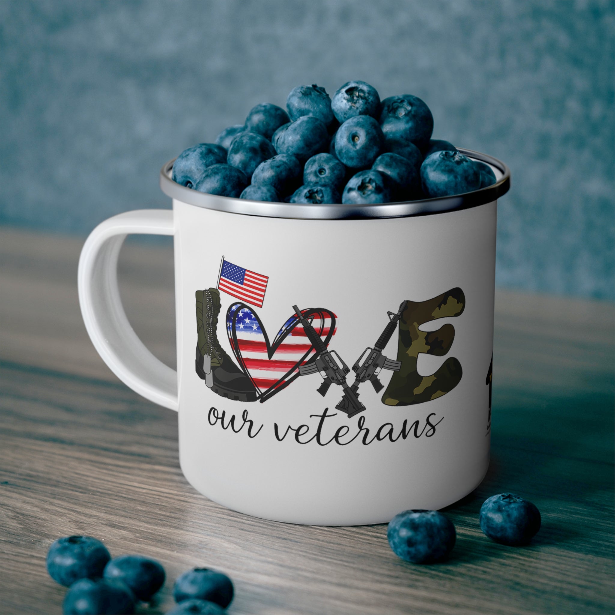 “Love Our Veterans” Enamel Mug with American Flag Heart, Rifle, and Camo Lettering