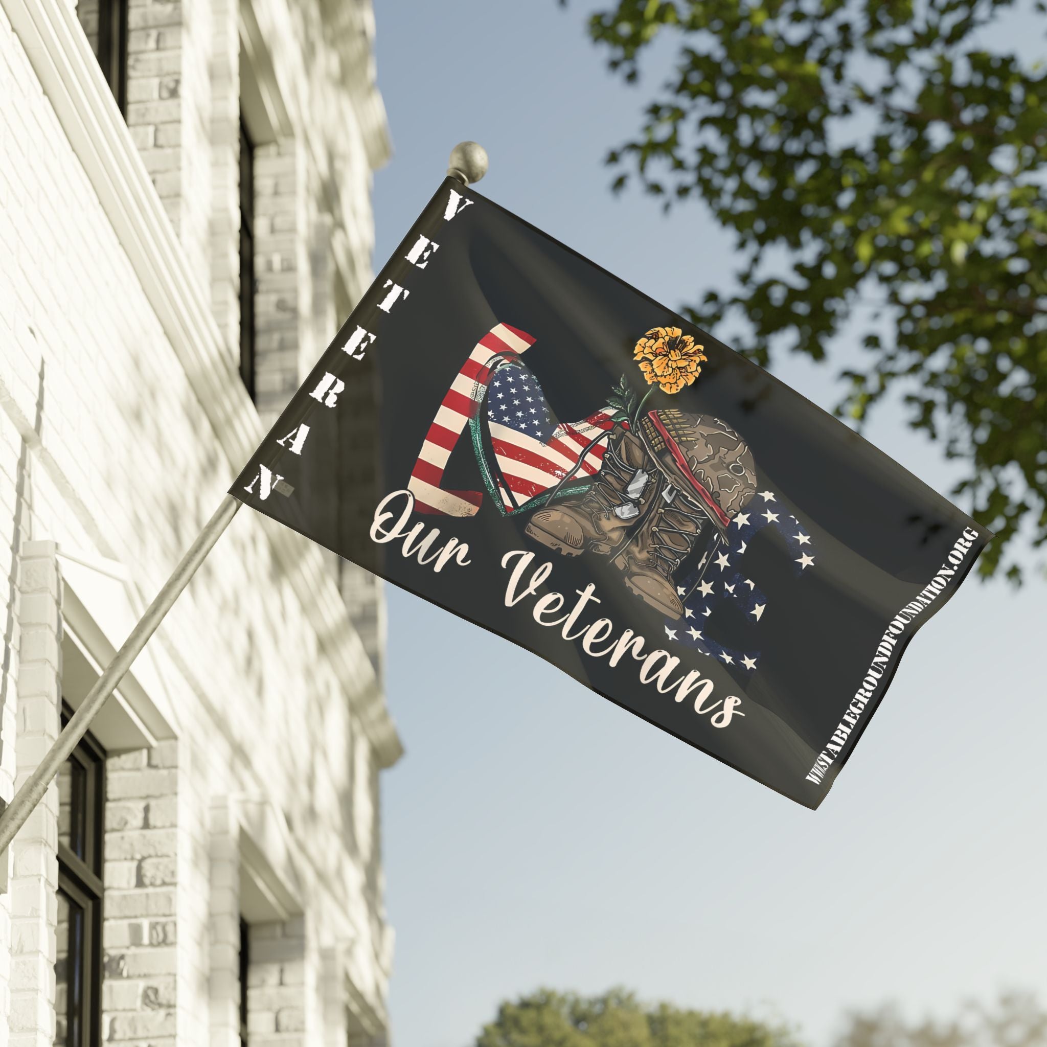 A patriotic flag featuring the word “LOVE” made of an American flag heart, combat boots, and a military helmet with the text “Our Veterans,” honoring service and sacrifice.