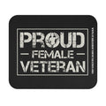 Black mouse pad with bold distressed white text that says Proud Female Veteran with soldier silhouette