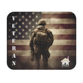 Veteran mouse pad with American flag and soldier standing in silhouette.