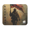 Veteran soldier holding American flag walking through battlefield smoke – patriotic military mouse pad.