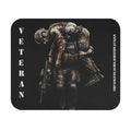 Mouse pad showing a soldier carrying his wounded comrade with the word Veteran printed vertically beside them.