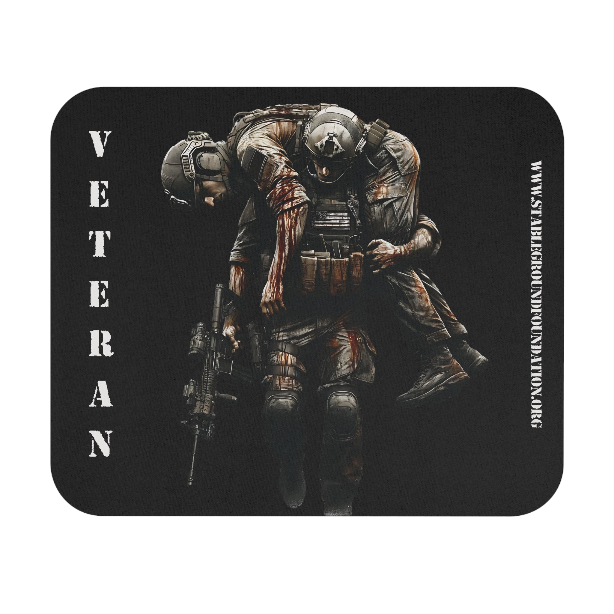 Mouse pad showing a soldier carrying his wounded comrade with the word Veteran printed vertically beside them.